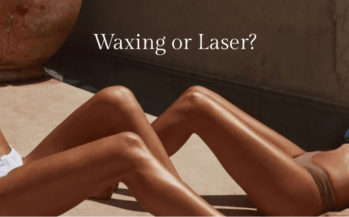 Editorial cover reading 'Waxing or Laser?' — smooth, sunlit bare legs resting on a warm sandstone floor beside a weathered terracotta urn, set against a moody clay-coloured wall at The Wellness Ed.